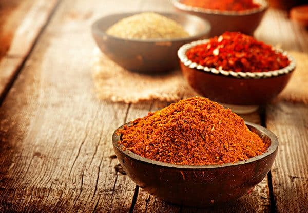 Cinnamon, mint, and cayenne pepper all work as great natural ant repellants.