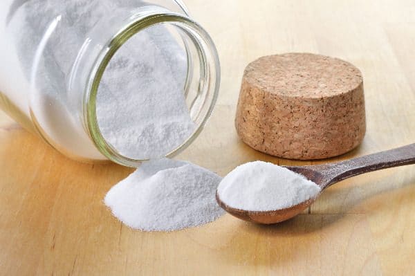 The best natural glass cleaner is baking soda, which grinds away the dirt without hurting the glass.