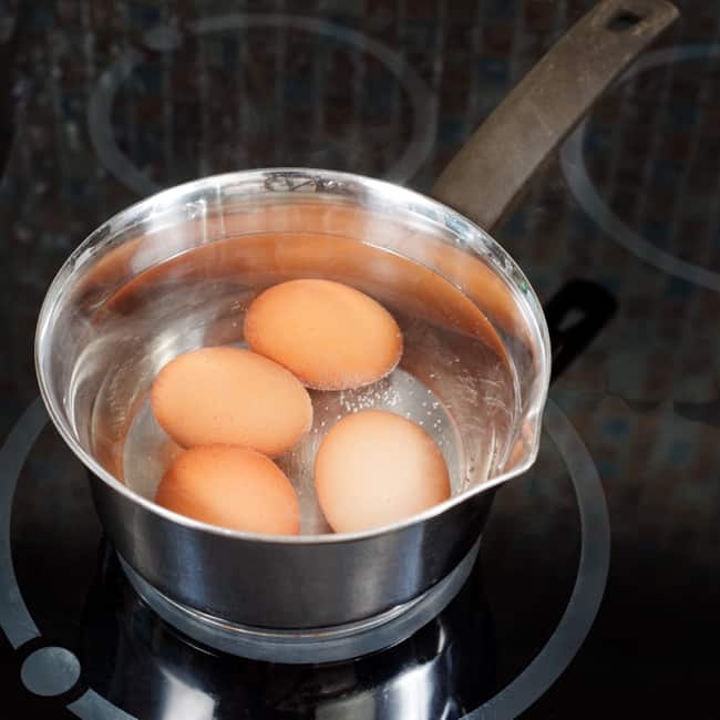 hidden white vinegar uses to boil eggs perfectly